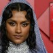 Simone Ashley topless aux Fashion Awards